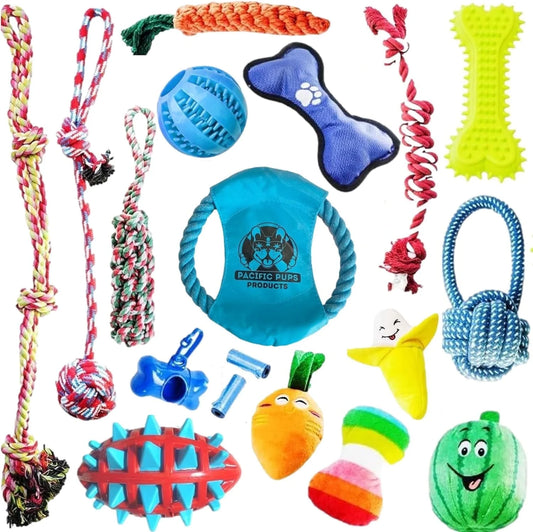 Assorted dog toys including bones, balls, and ropes on a white background