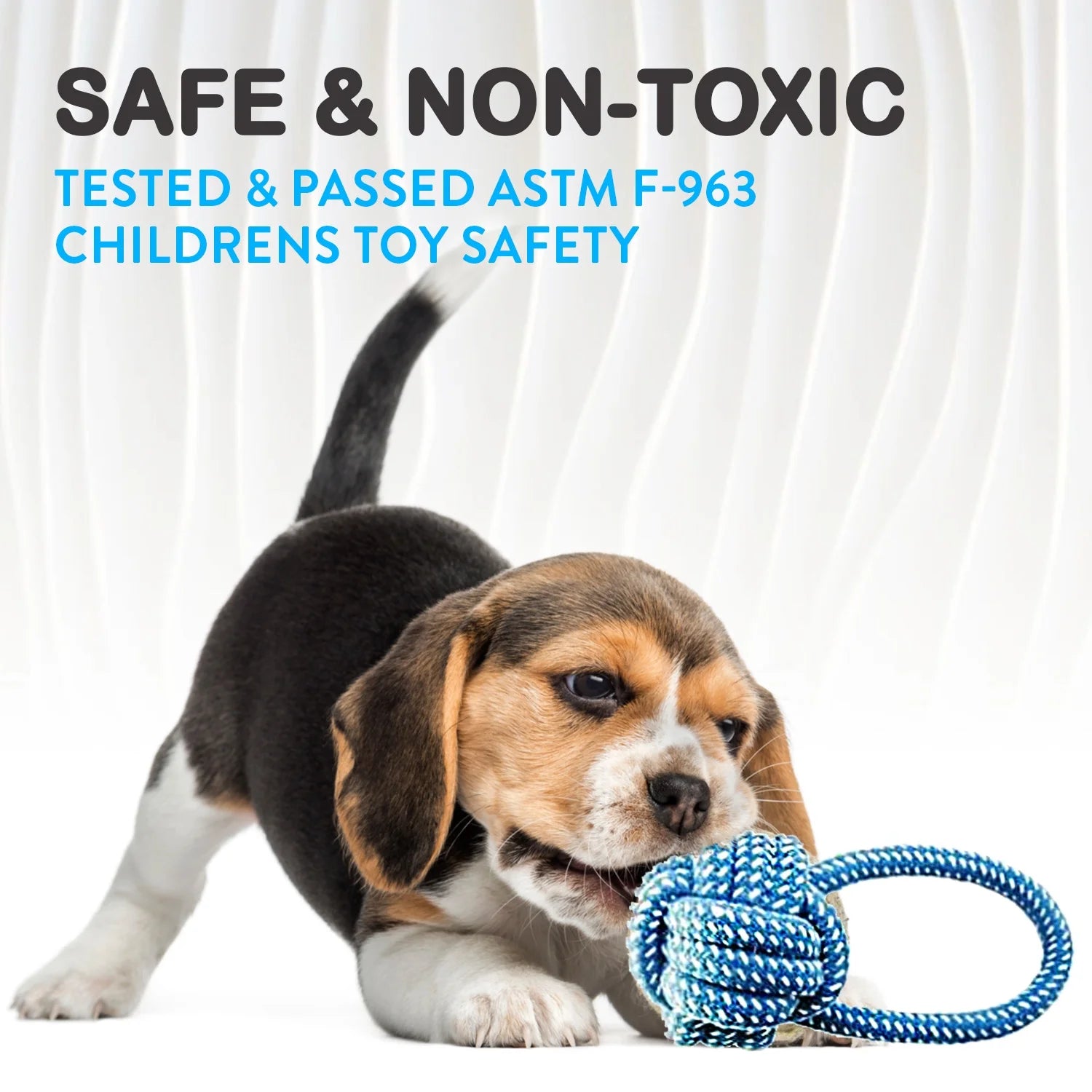 Puppy playing with a blue rope toy against a white background, with text about safety certification.