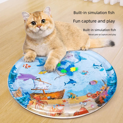 Cat sitting on a cooling bed cushion with a built-in simulation fish design