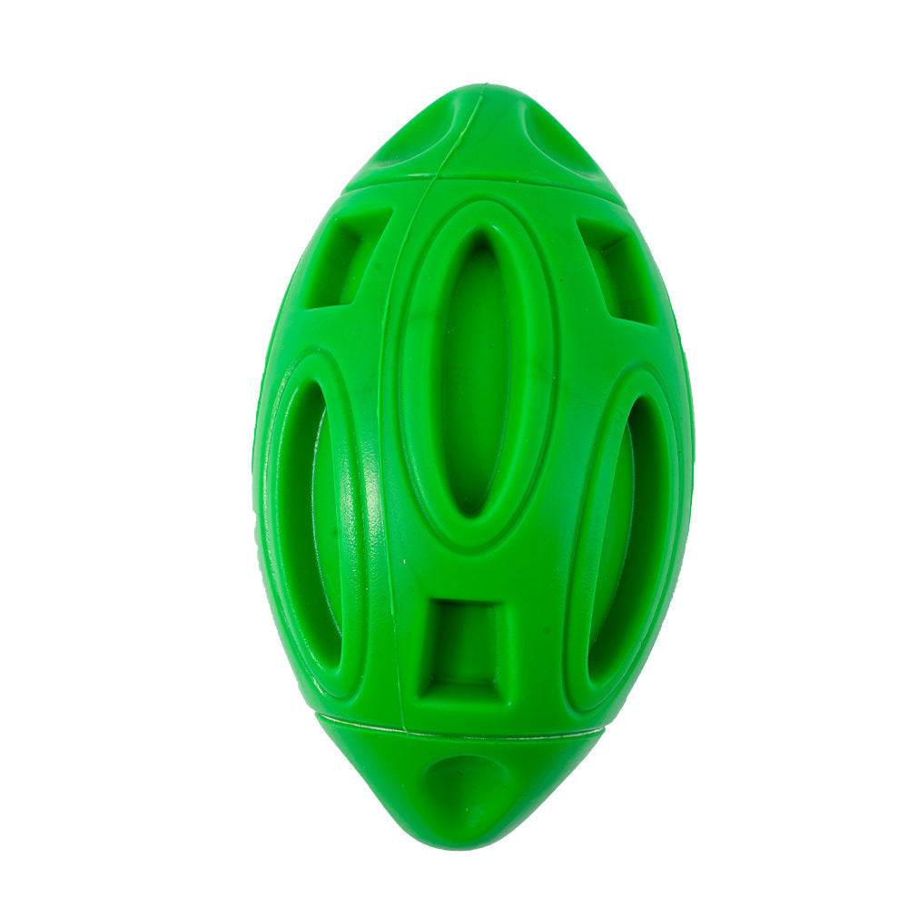 Durable rubber dog chew ball with squeaker for teething puppies and aggressive chewers green variant