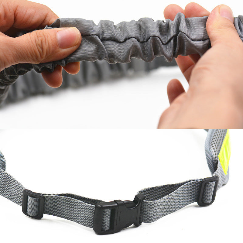 Person showcasing the durability and quality of the hands-free dog running traction set, highlighting the adjustable waist belt and retractable leash