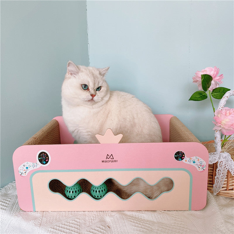 Pink heart-shaped cat scratcher with ball for female cats up to 10 kg. Durable, stylish, and perfect for playtime and claw maintenance cover image