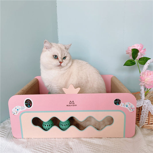 Pink heart-shaped cat scratcher with ball for female cats up to 10 kg. Durable, stylish, and perfect for playtime and claw maintenance cover image