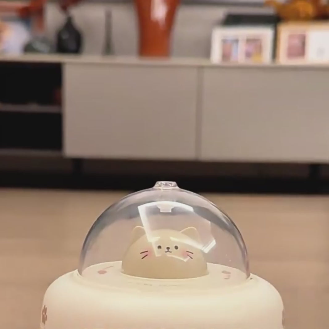 video showing a cat playing with the product